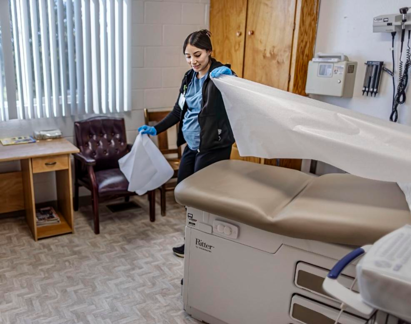 Medical worker setting up room